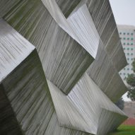 Giorgi Khmaladze Architects encloses Tbilisi coffee factory in folded concrete