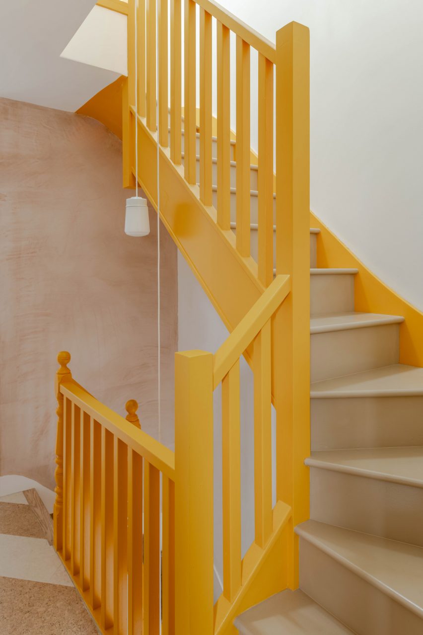 Yellow staircase within Cork House by Office S&M