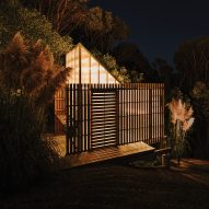 Fabric creates timber and polycarbonate shed to double as light sculpture