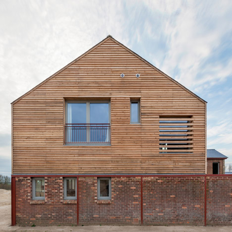 A-Zero turns an English cowshed into a timber-framed family home