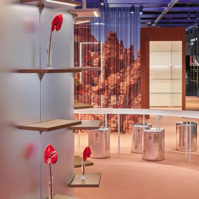 Modular shelving and lighting systems at a trade fair stand